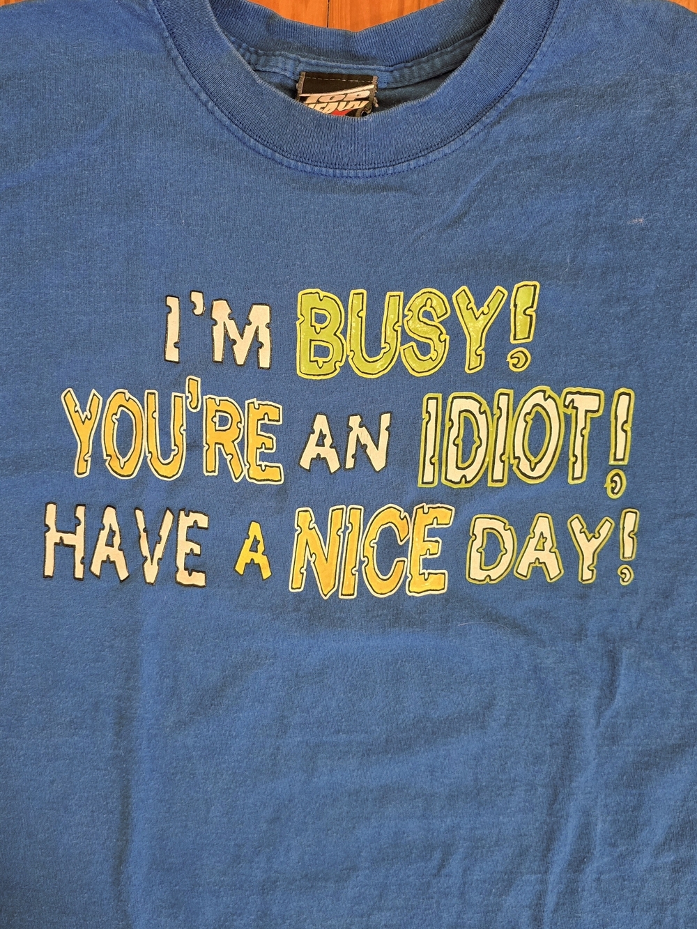 Vintage Y2K 2002 Novelty Men's Blue Short Sleeve Tee with Yellow Graphic